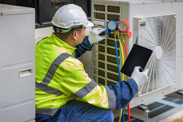 Professional Hvac technician working in Midland, WA